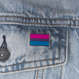 An image of a bisexual pin on a denim jacket pocket