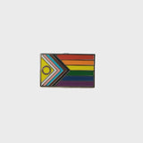 A video of a rotating Intersex Inclusive Pride pin