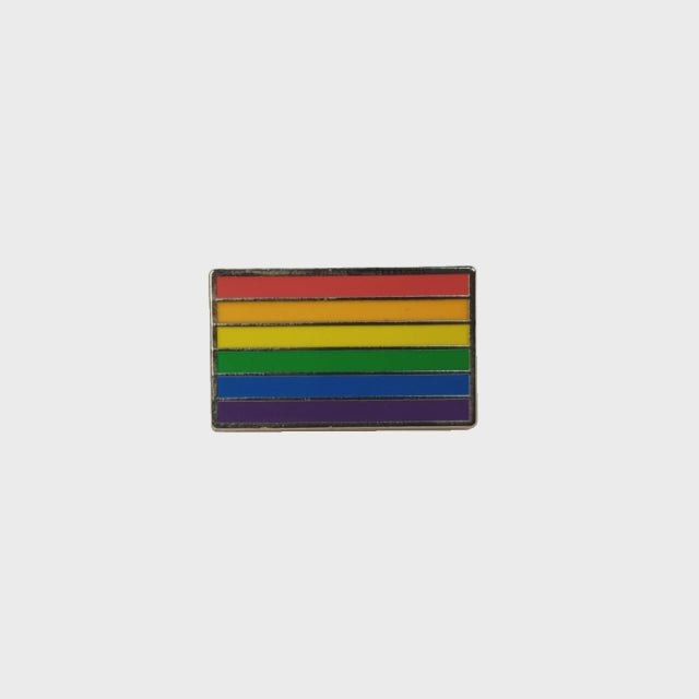 A video of a rotating rainbow pin